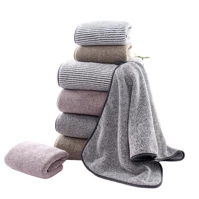 China Custom Compressed Luxury Bamboo Charcoal Fiber Towels Fast Dry Microfiber Bath Towel Set for sale