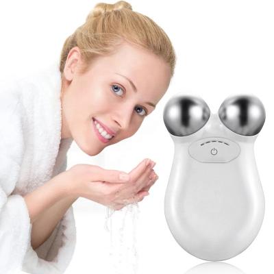 China Face Roller Massager For Trimming Machine Skin Care Tightening Micro Current Home Use EMS Beauty Facial Massage Instrument for sale