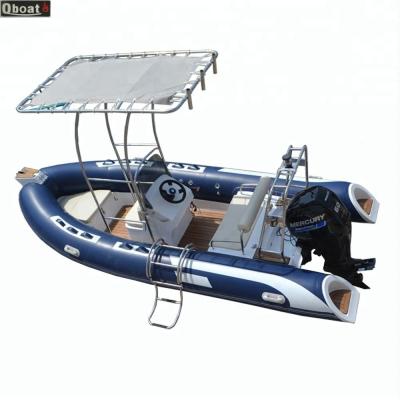 China Racing 20 Years China Supplier 8 Person Semi Rigid Fiberglass Hull Inflatable Rowing Boat With Outboard Motor for sale