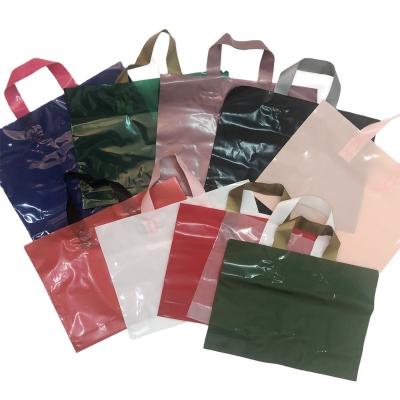 China Recyclable Plastic Design Custom Printing Clothes Carry Bag / Custom Plastic LDPE Handle Clothing Packaging Bag / Shopping Bags With Handle for sale