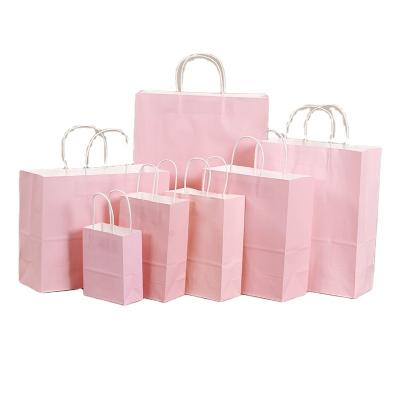 China Recycled Materials Wholesale Custom Logo Printed Paper Kraft Paper Shopping Gift Bag With Handle for sale