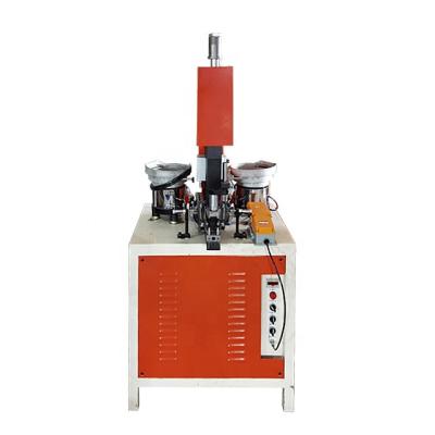 中国 Automatic rivet feed rivet machine cookware dispensing handle automatically riveting machine 販売のため