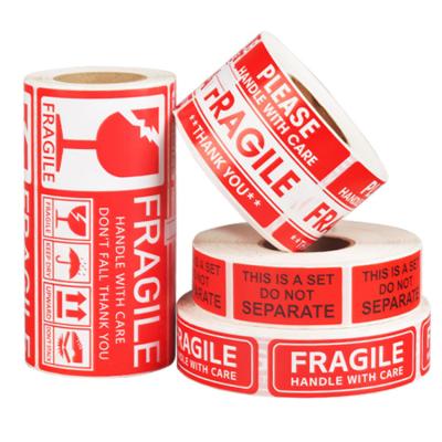 China Cartoon Sticker Roll Permanent Adhesive Warning Sign Sticker Custom Handle With Care Fragile Box Packing Shipping Labels for sale