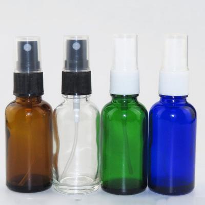 China Personal care spray bottle 30ml e juice glass amber blue green clear liquid bottles with spray cap for sale