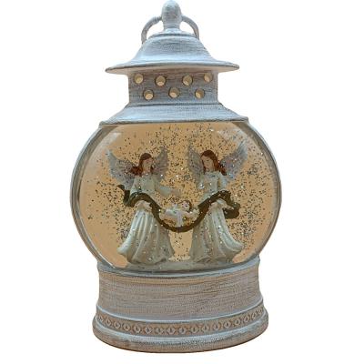 China 2021 Decoration Lantern Fashion Resin Crafts Gifts Water Pots Snow Religion Wind Blowing Light For Decoration for sale