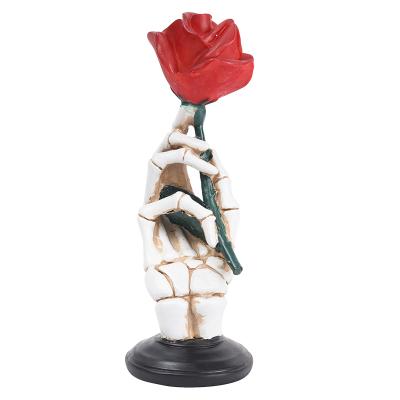 China 2021 New Halloween Decoration Product Ideas Resin Crafts Ghost Hand Rose Ornament For Home Decorations for sale