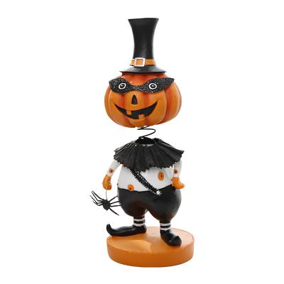 China Halloween Decorations 2021 Fashion Shaking Pumpkin Figurine Dollhouse Resin Head Crafts For Halloween Decorations for sale