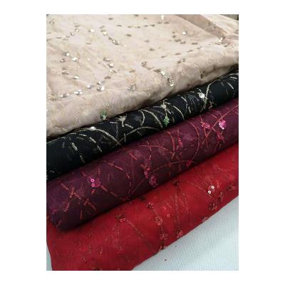 China Customized flame retardant gold glitter color polyester net mircofiber mesh fabric for T-shirt for sale