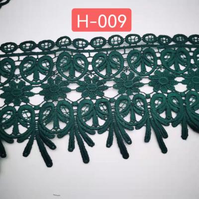 China Breathable Polyester Chemical Embroidered 3d Flower Green Lace Trim Fabric For Apparel Decoration for sale