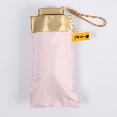 China Vintage 50% Flat Off Folding Small Gold Umbrella Gold Caps Sun Protection Mini Umbrella Folding Pocket Manual Umbrella for sale