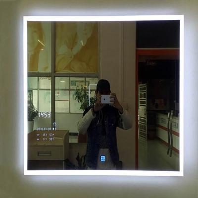 China Newest Touch Screen Smart Wifi LED Lighted Bathroom Mirror With Time Temperature Clock for sale