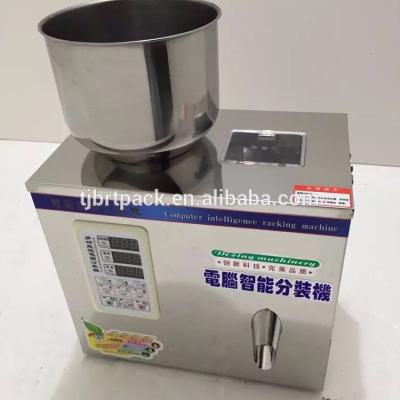 China 1-25g CLOTHING Tea Food Seed Grain Filling Machine Powder Filling Machine High Quality Dry Dispensing Machine for sale