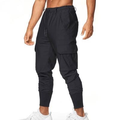 China 2022 New Men's Anti-wrinkle Youth All-match Quick-Drying Casual Multipack Running Pants Exercise Fitness Sports Pants for sale