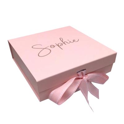 China Recycled Paper Folding Luxury Cardboard Materials Flat Pack Box Ribbon Pink Closures Book Shaped Foldable Packaging Gift Boxes With Magnetic Lid for sale