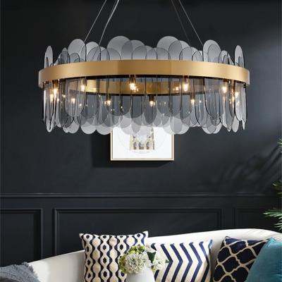 China Modern luxury large round smoke glass gold circle chandeliers and pendant lights for high ceiling decoration for sale