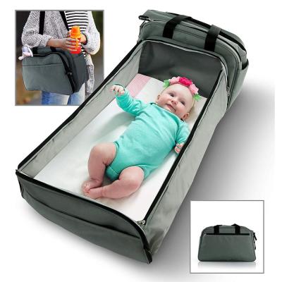 China Ployester Baby Travel Diaper Bags Multifunctional Cribs Diaper Bag with Changing Station for sale