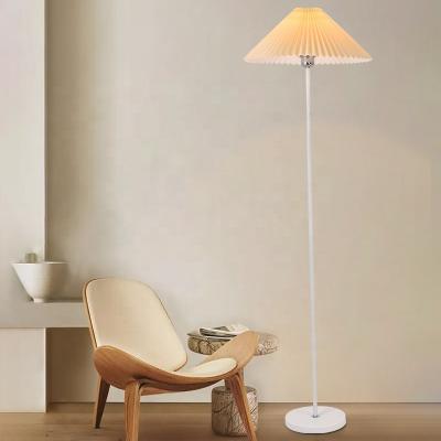 China Modern hotel standing led bedroom high quality cheap bedside living room floor lamp prices modern corner fancy floor lamps for sale