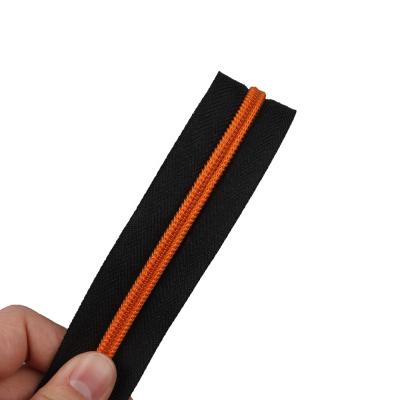 China Black Color Fade Proof Feature Custom Fashion Zipper Roll And Zipper High Quality Good for sale