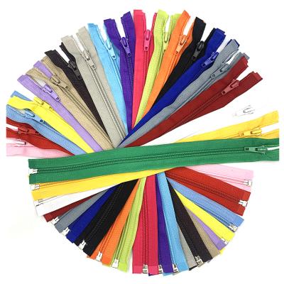 China Auto Lock Free Sample #5 #3 #4 #7 Customized Color Nylon Strip Model Zipper for sale