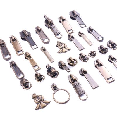 China Factory Wholesale Bronze Puller Zipper Slider Bag Runner Zipper Slider Nickel Free For Zipper for sale