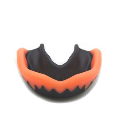 China Single Side Double Side Customized Logo Kids/Adult Sports Boxing Teeth Protector Gum Shield Mouth Guard for sale