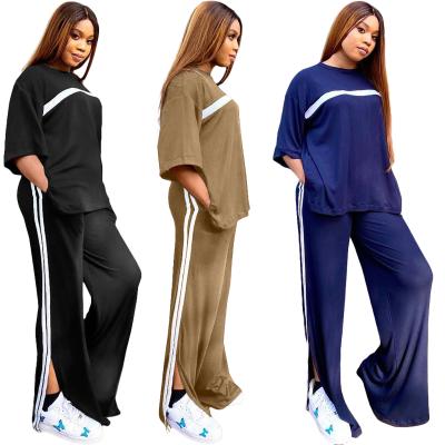 China 2021 New Design Autumn Winter Women Breathable Solid Color Ribbed Cut 2 Piece Two Piece Jogging Suit for sale