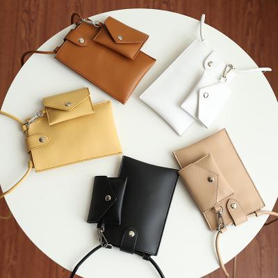 China New Design Lanyard Women's PU Bag Wholesale Waterproof Dragons Leather 2 In 1 Mobile Phone Bag for sale