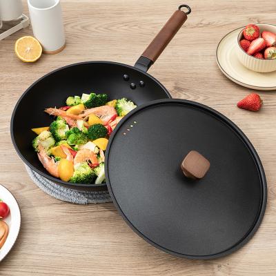 China 32cm Sustainable Stick Non Frying Iron Pan Household Cooking General Japanese Induction Cooker Iron Pan Kitchen Tableware Gift for sale