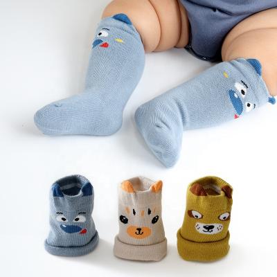 China XIANGHUI Breathable Kids Soft Eco-friendly Cotton Seamless Tube Cartoon Baby Long Socks for sale