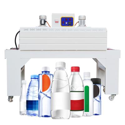 China 220/380V Plastic Voltage L Type Semi-automatic Heat Steam Sealer Pet Bottle Carton Food Shrinking Packing Machine for sale