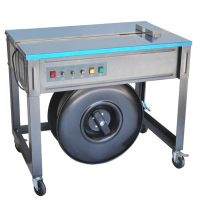 China Polypropylene PP Semi Automatic Vertical Automatic Pallet Carton Small Food Table Bottom Strapping Machine for sale