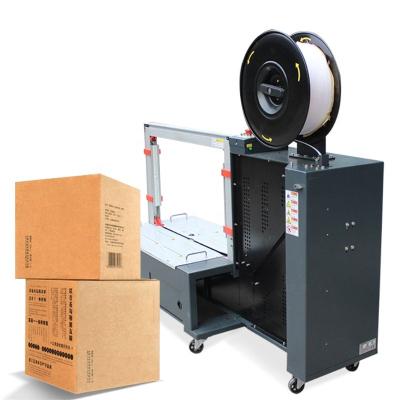 China CLOTHING PP Belt Machine Low Tabletop Industrial High Speed ​​Cardboard Strapping Automatic Full Pallet Strapping Machine for sale