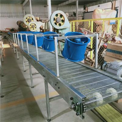 China Cooling System Heat Resistant Steel Mesh Chain Conveyor Mesh Belt Herringbone Conveyor for sale