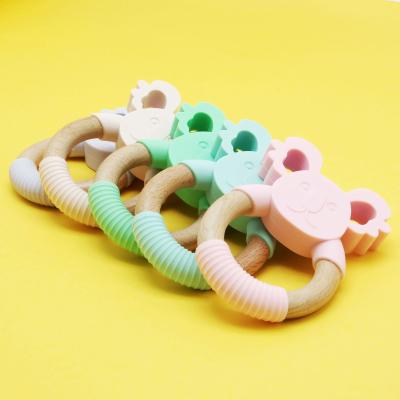 China Wholesale Smooth Silicone Funny Toys Wooden Handle Baby Teethers Sound Gift Sets For Baby Infant for sale