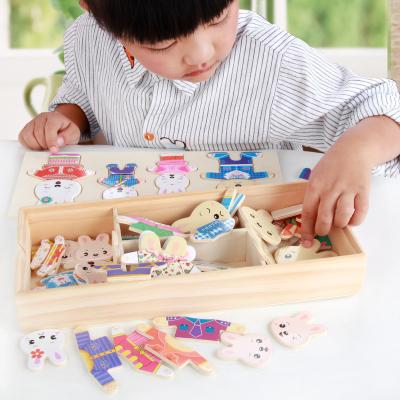 China DIY TOY Creative Montessori Kids Jigsaw Puzzle Toy Rabbit Family Change Wooden Clothes Dressing Game Baby Toys Girls for sale