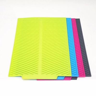 China Factory Viable Colorful Silicone Non-Slip Foldable Kitchen Dinning Mat Non-Slip Foldable Silicone Tripod Silicone Dish Sink Heat Resistant Drying Mat for sale