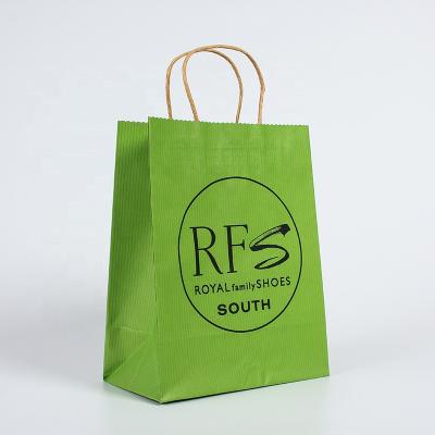 China Disposable Custom Logo Printed Green Matte Recycled Kraft Paper Retail Shopping Paper Bags for sale