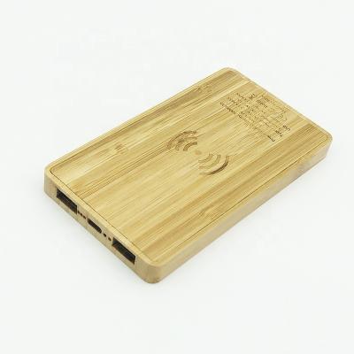 China Mobile Phone Customized Bamboo Wireless Power Bank 5000mAh Li Battery Safe Slim Power Bank for sale