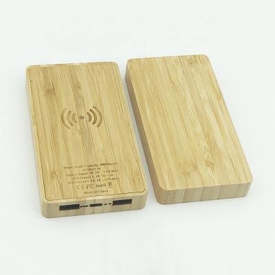 China Newest Mobile Phone Travel Bamboo Power Bank 10000mAh Led Solar Wireless Power Bank With Dual USB for sale