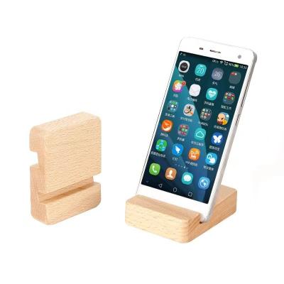 China Consumer Electronics Universal Wooden Phone Stand Single Cell Phone/Tablet Holder Two Holes Standing For Smartphone Tablet Devices for sale