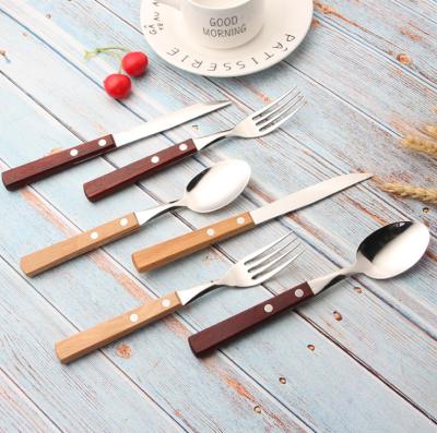 China Sustainable Cutlery Wooden Handle Knife Spoon Fork Handle Bamboo Flatware for sale