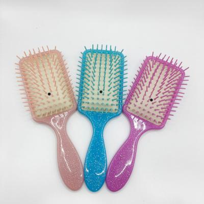 China Comfortable Professional Plastic Cushion Massage Paddle Hair Brush Airbag Comb for sale