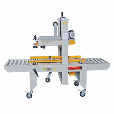 China Semi-automatic CLOTHING carton box sealing machine, carton box sealer for sale