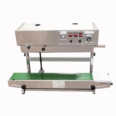 China CLOTHING Tape Sealer Vertical Continuous Plastic Bag Sealer for sale