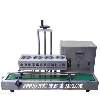 China Automatic Beverage Induction Bottle Aluminum Foil Sealing Machine for sale