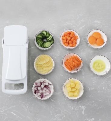 China Viable Multifunctional Food Chopper Vegetable Chopper Grater and Dicer Onion Food Cutter Slicer with Container for sale