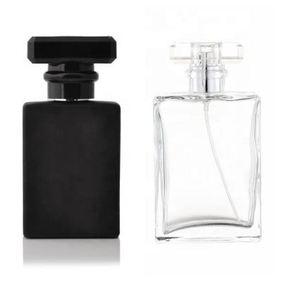 China Personal Care High End Square Glass Transparent White Perfume Bottle 30Ml 100Ml 50Ml Perfume Bottle Black for sale