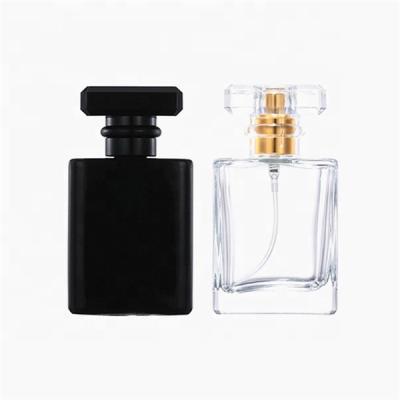 China Personal Care Low Moq Square White Transparent 100Ml 30Ml 50Ml Black Perfume Bottle With Logo for sale