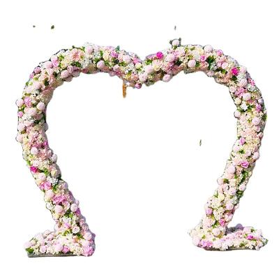 China Elegant Metal Heart Shaped Shelf with Rose Flower Row Arrangement Set Outdoor Wedding Arch Backdrop Party Stage Props Decor Flower Stand for sale