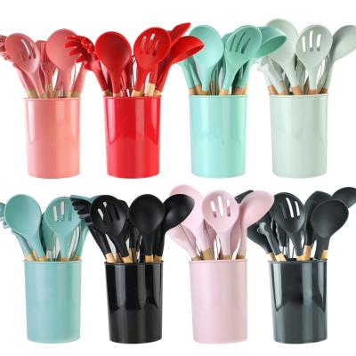 China 12 Pcs Non-Toxic Sustainable Cooking Tools Kitchenware Cocina Spatula Silicone Cooking Utensils Set With Wooden Handles for sale